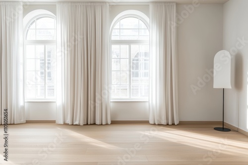 Refined interior featuring symmetrical arched windows, white curtains, and warm wooden floors bright and spacious atmosphere perfect for versatility