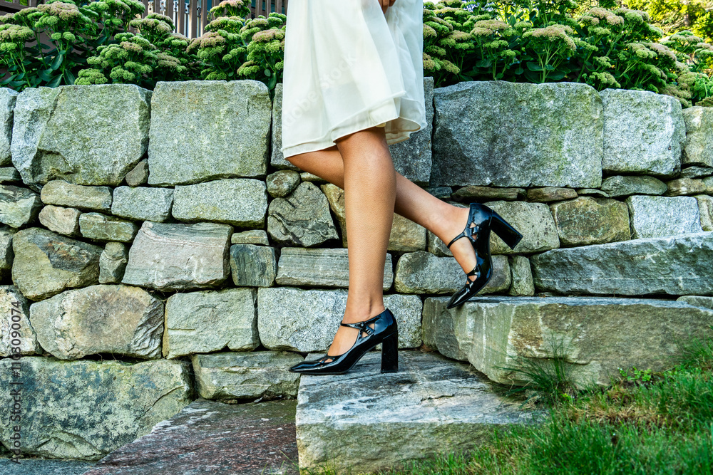 woman walking on a stone steps woman walking on a stone steps