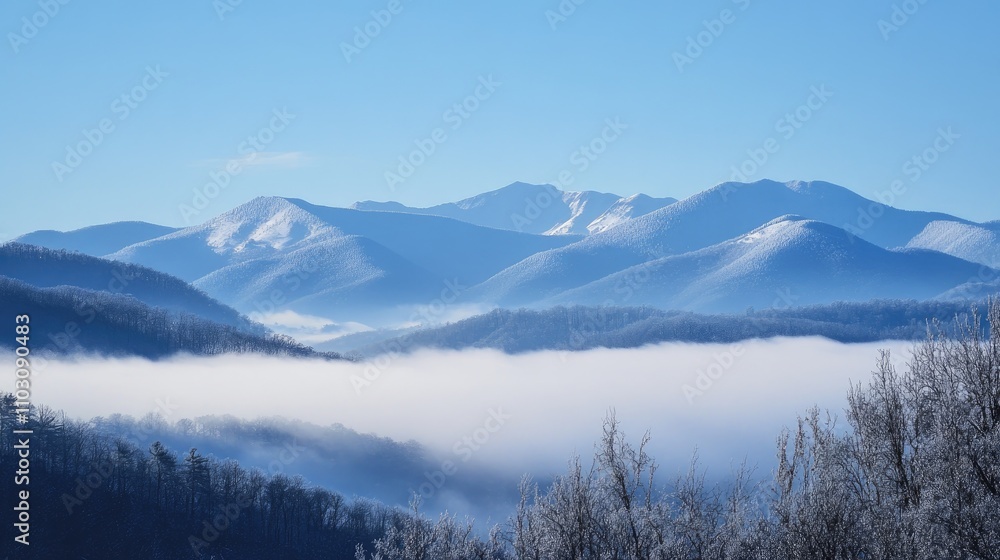 Telephoto view of majestic snowy mountains enveloped in soft fog under a clear blue sky, showcasing serene winter beauty and distant peaks. Telephoto view of majestic snowy mountains enveloped in soft fog under a clear blue sky, showcasing serene winter beauty and distant peaks.