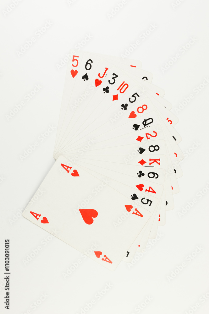 Obraz premium Top view of playing cards on white background. Board game, poker. Copy space, flat lay.