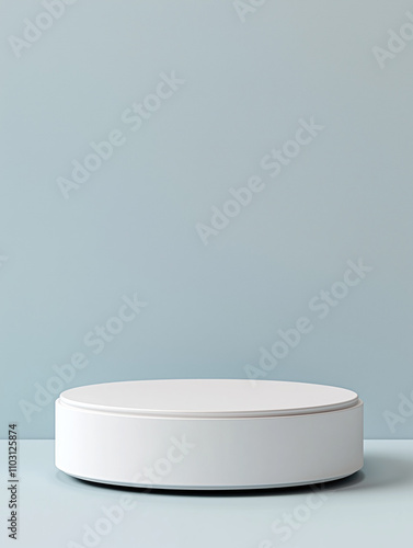 White round podium on a blue wall