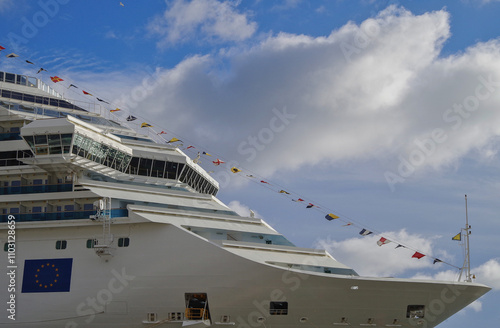 Modern Italian cruiseship cruise ship liner Fascinosa during sunset in port of Savona, Italy during summer Mediterranean cruising photo