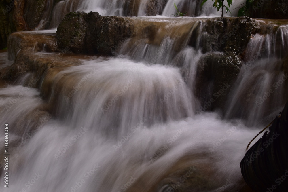 Travel to waterfalls during the rainy season, The tiers of the waterfall contrast beautifully with the sky Travel to waterfalls during the rainy season, The tiers of the waterfall contrast beautifully with the sky