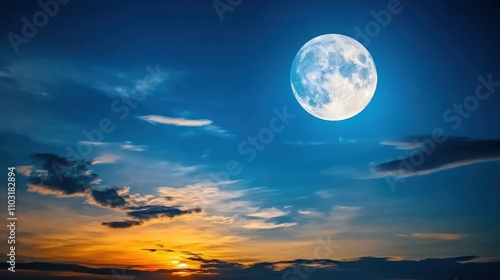 Majestic Full Moon Illuminates Blue Sky at Dusk Twilight Hour