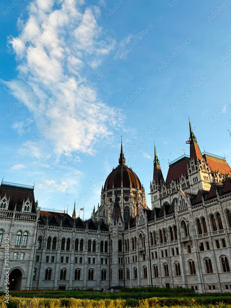 Majestic architectural structure under a vibrant blue sky. Hungarian Parliament Building. Majestic architectural structure under a vibrant blue sky. Hungarian Parliament Building.