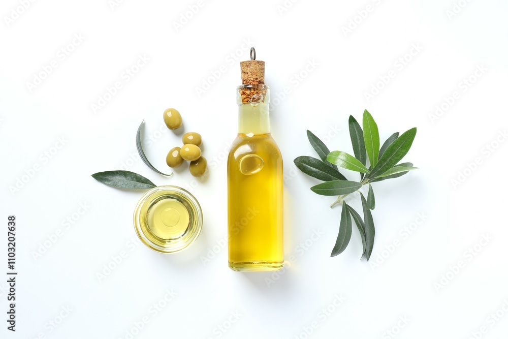 Bottle of fresh olive oil and olives with leaves on white background Bottle of fresh olive oil and olives with leaves on white background