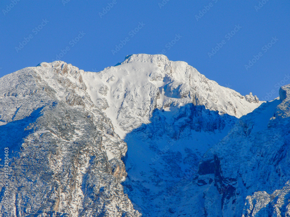 View of the snow-covered and highest Monte Baldo summit Cima Valdritta 2218m.