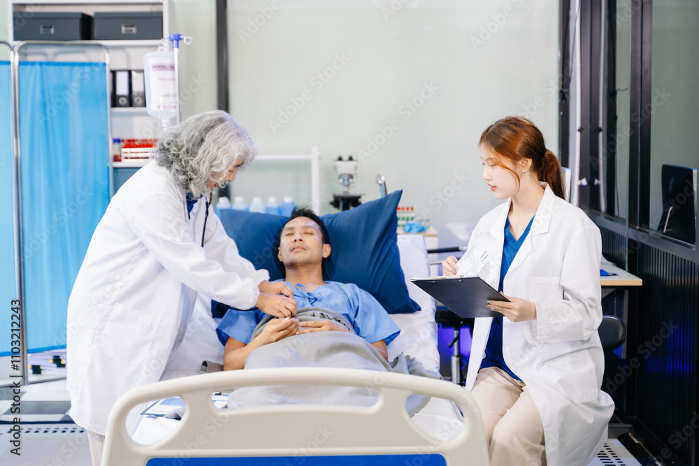 Hospital Ward Male and Male Professional Asian Doctors Talk with a Patient, Give Health Care Hospital Ward Male and Male Professional Asian Doctors Talk with a Patient, Give Health Care