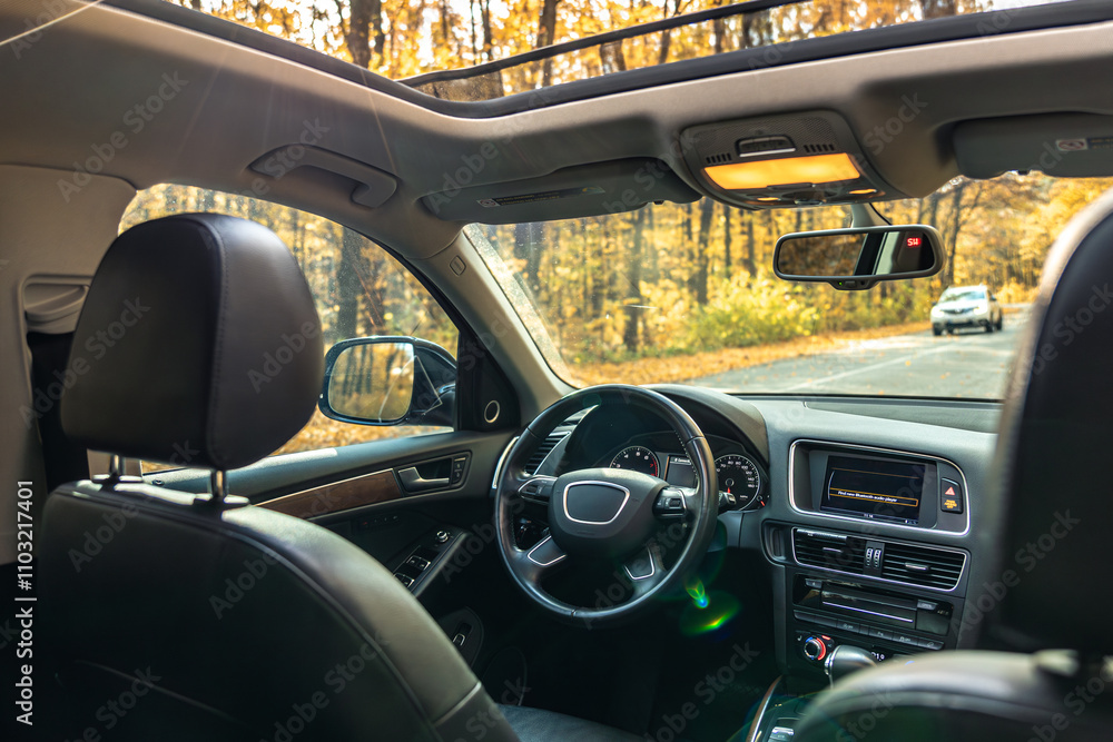 Car view from the inside. Car steering wheel and interior. Car view from the inside. Car steering wheel and interior.