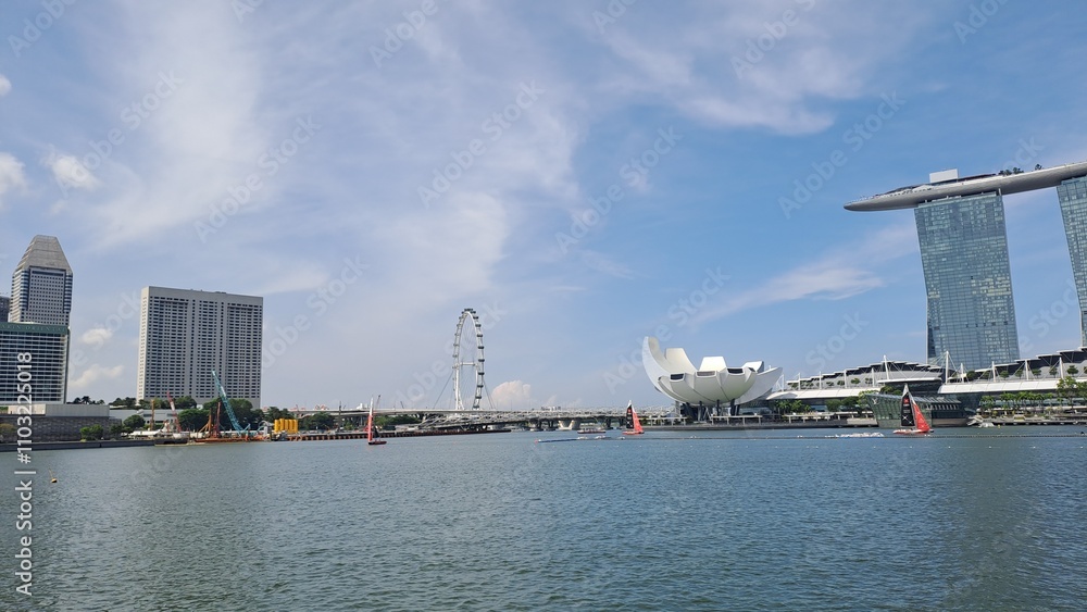 Blue Sky With Cool Wind In Marina Bay, Singapore Blue Sky With Cool Wind In Marina Bay, Singapore