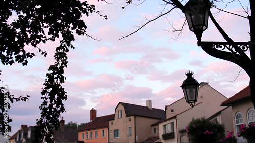 Pastel sky and romanticized village details evoke nostalgia and poetic beauty photo