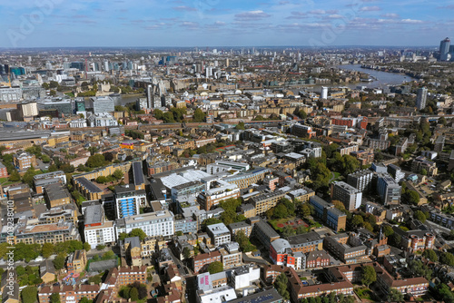 The River Thames winding through a sprawling London cityscape, emphasizing the cultural and historic heart of the capital