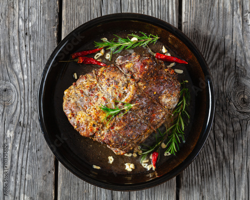 Juicy Roast Pork Neck on table, top view