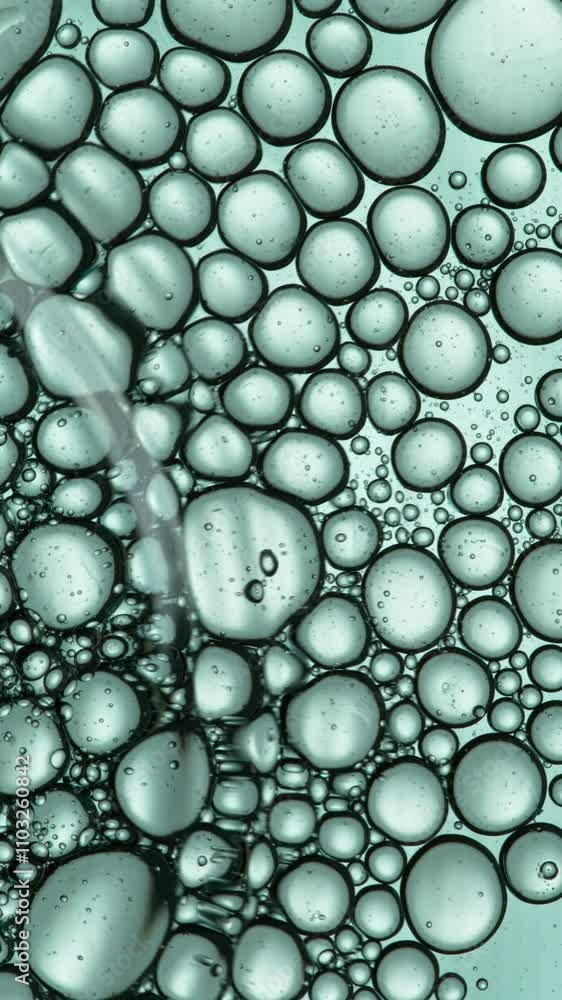 Super Slow Motion Shot of Moving Oil Bubbles on Light Background at 1000 fps Super Slow Motion Shot of Moving Oil Bubbles on Light Background at 1000 fps