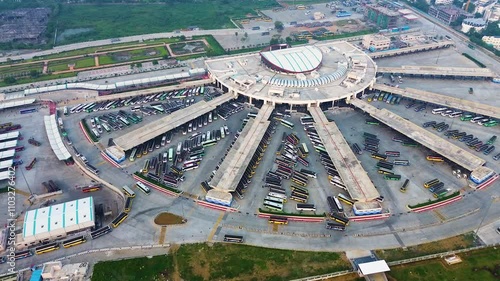 Drone orbit around the Kalaignar Centenary Bus Terminal in Kilambakkam, Chennai. The world's largest bus terminal. photo