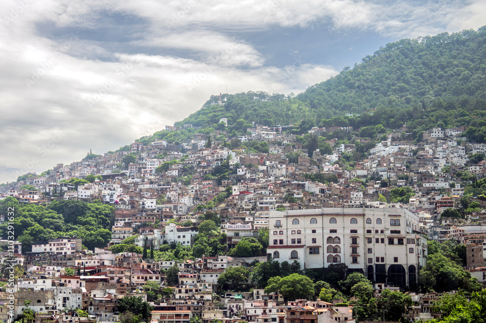 Taxco hillside architecture and vibrant communities under a clear sky Taxco hillside architecture and vibrant communities under a clear sky