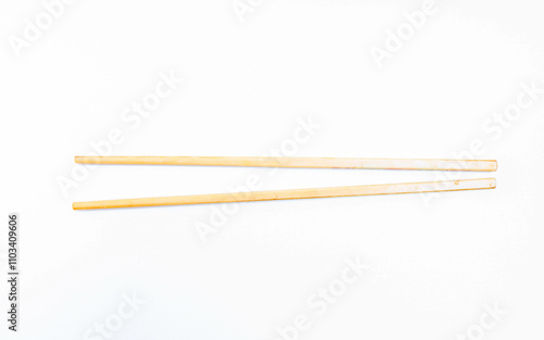 Traditional wooden chopsticks isolated on white background.