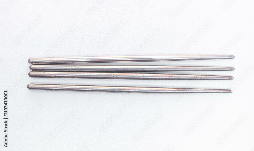 Collection of traditional metal color Chopsticks isolated on white background. Collection of traditional metal color Chopsticks isolated on white background.