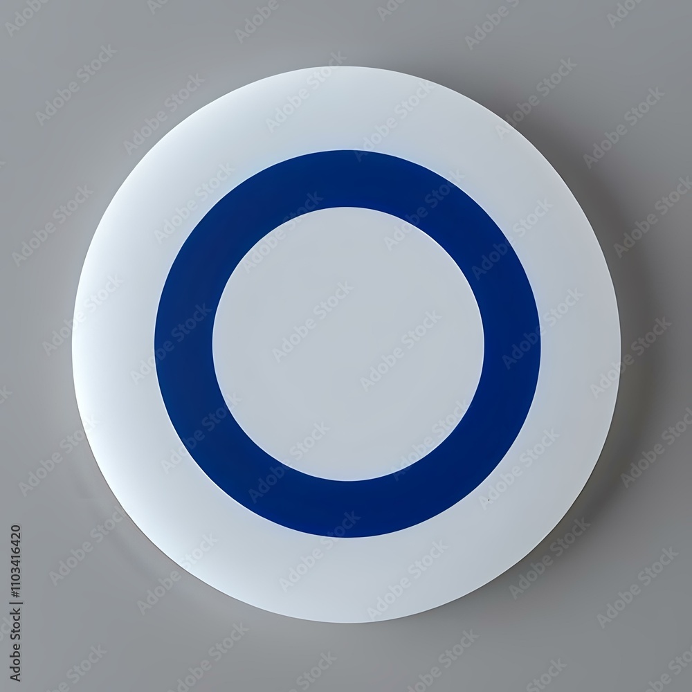 A white and blue circle on a gray wall A white and blue circle on a gray wall