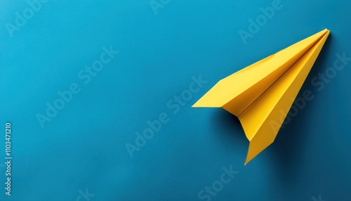 Yellow Paper Plane on Blue Background - Symbolizing Success in Business Growth