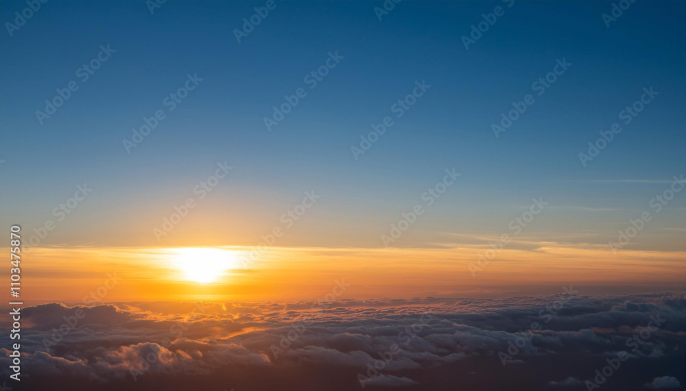 Sun Setting Over Clouds in Sky and Copy Space Sun Setting Over Clouds in Sky and Copy Space
