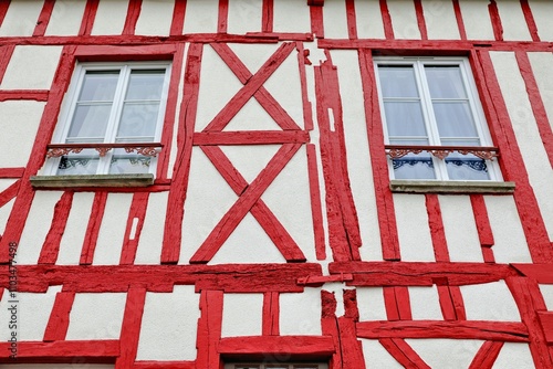 Windows of typical half-timber house in medieval city of Provins, France.