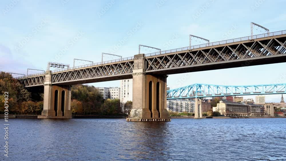 Newcastle UK:29th Oct 2024. River Tyne famous bridges on sunny winter afternoon during golden hour. King Edward VII Bridge railway crossing Newcastle UK:29th Oct 2024. River Tyne famous bridges on sunny winter afternoon during golden hour. King Edward VII Bridge railway crossing