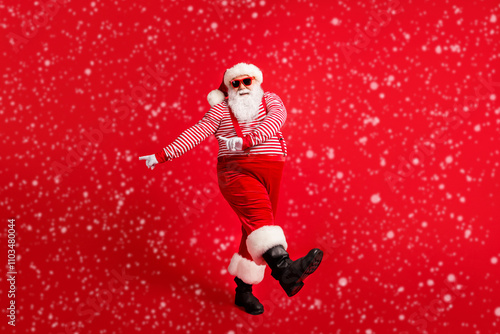 Full length body size view of his he nice handsome attractive cheerful Santa dancing having fun celebratory festal day x-mas occasion isolated bright vivid shine vibrant red color background