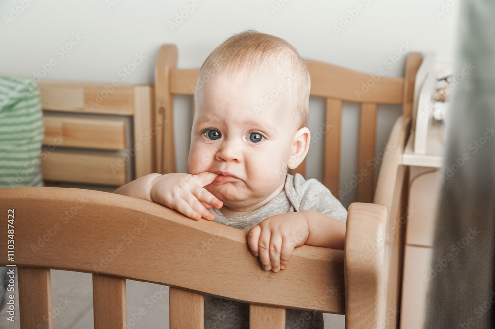 Curious Baby Standing in a Wooden Crib Curious Baby Standing in a Wooden Crib