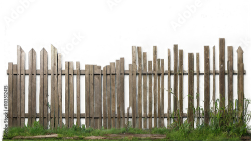 Weathered wooden fence with uneven heights and gaps, showing age and wear. Grass and weeds grow at the base transparent background photo