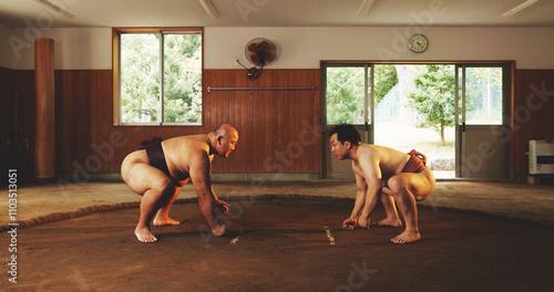 Photos Japanese men, sumo wrestling and sport for fight, tradition and culture in dohyo ring