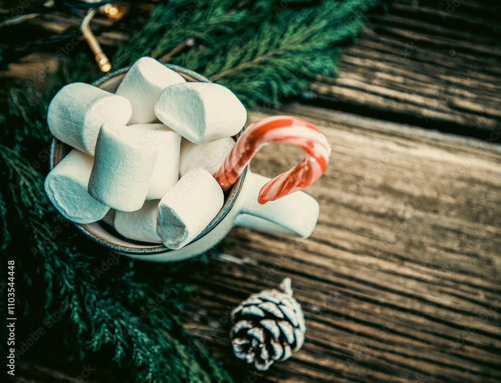 Fototapeta premium hot Christmas drink with marshmallow on wooden table