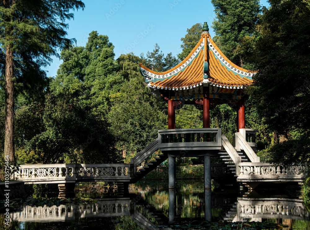 Chinese pavilion amidst greenery Chinese pavilion amidst greenery