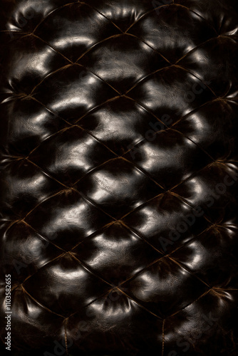 Obraz na płótnie Elegant dark leather texture with intricate tufting and a glossy finish w salonie