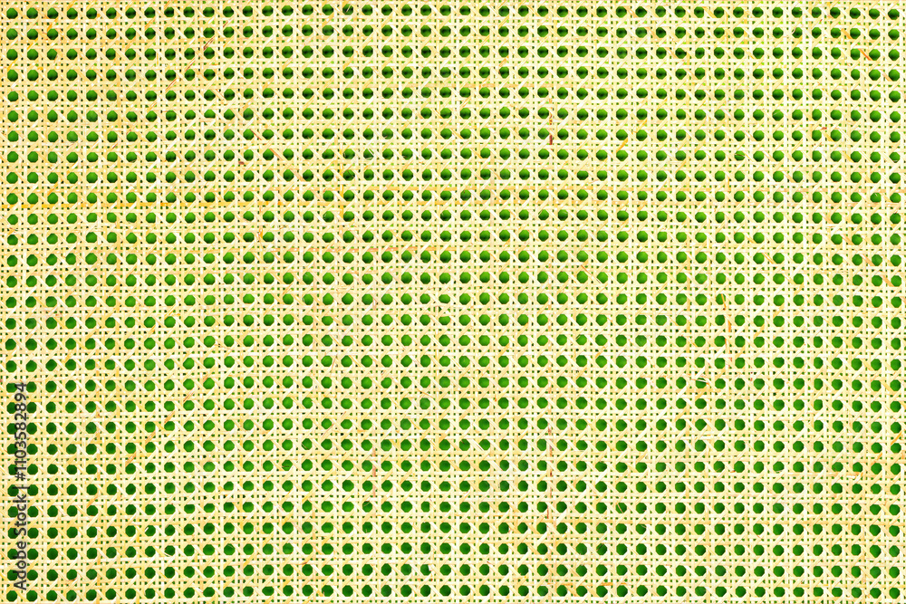 Intricate pattern of vibrant green and yellow circles creating a harmonious visual tapestry