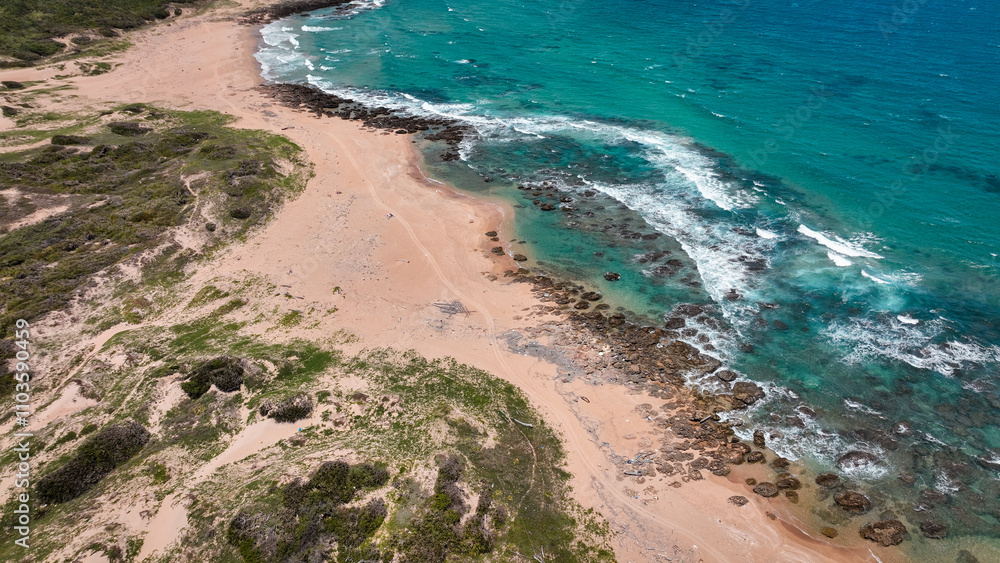Serene coastal view at Longpan Park in Taiwan revealing sandy shores and turquoise waters Serene coastal view at Longpan Park in Taiwan revealing sandy shores and turquoise waters