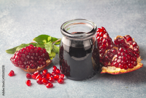 Glass bottle of pomegranate...