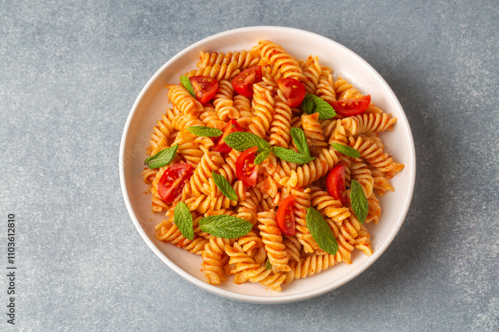 Fusilli pasta, spiral or spirali pasta with tomato sauce - Italian food style