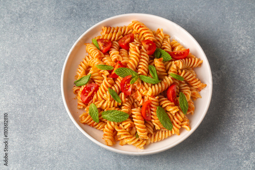 Obraz na płótnie Fusilli pasta, spiral or spirali pasta with tomato sauce - Italian food style w salonie