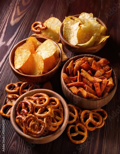 Salty snacks. Pretzels, chips, crackers  photo