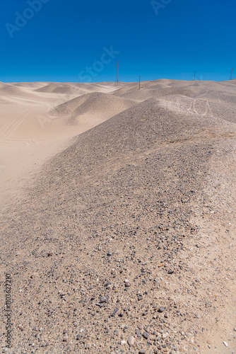 Sands and hills along the desolated lands of Qinghai-Xinjiang highway, China photo