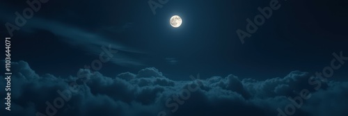 The image depicts a nighttime sky filled with dark, puffy clouds