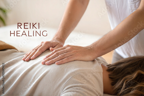 Woman having reiki healing treatment, alternative medicine concept.