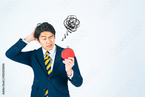 Konstfotografi 貯金、お金、マネー、投資、給料、増税、ギャンブル、借金、税金、出費、コスト、支払い、ローン、悩む、困る、悩み、不安、心配、不満、落ち込む、がっかり、仕事、ビジネ