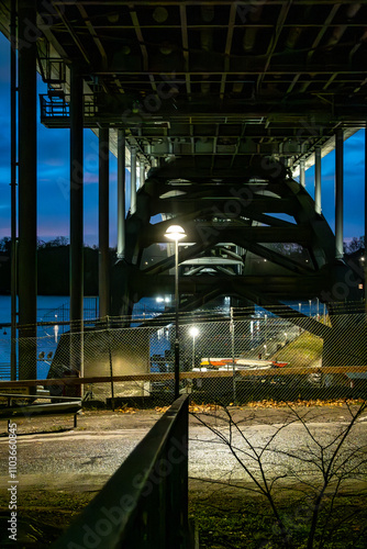 Stockholm, Sweden A view of the underside of the landmark Western Bridge, Vasterbron, at night connecting Kungsholmen to Sodermalm. photo