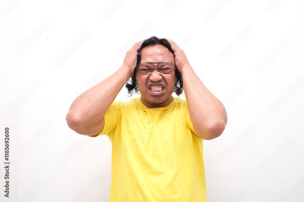 Fototapeta premium Asian man gesture who is feeling headache or migraine and vertigo isolated on white background