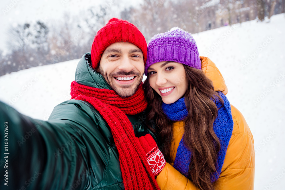 Fototapeta premium Photo of young cheerful couple happy positive smile hug shoot selfie picture holidays weekend outside