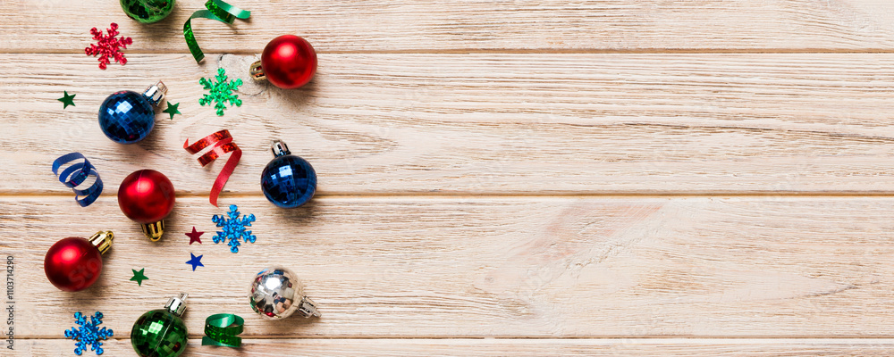 Christmas composition. a pattern of christmas balls on colored background. Flat lay, top view New year decor Christmas composition. a pattern of christmas balls on colored background. Flat lay, top view New year decor