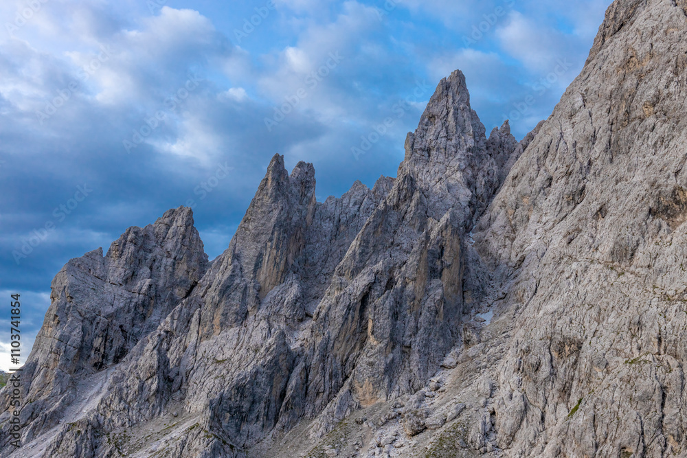 Dolomites mountains nasty weather in autumn with dark cloudy sky before the storm. Black clouds on the sky above the mountain rocky summits and peaks, stormy weather in the Dolomiti Alps, Italy Dolomites mountains nasty weather in autumn with dark cloudy sky before the storm. Black clouds on the sky above the mountain rocky summits and peaks, stormy weather in the Dolomiti Alps, Italy