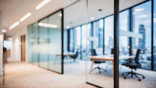 Blurred modern office space,met room and open workstations that convey professionalism and tranquility.